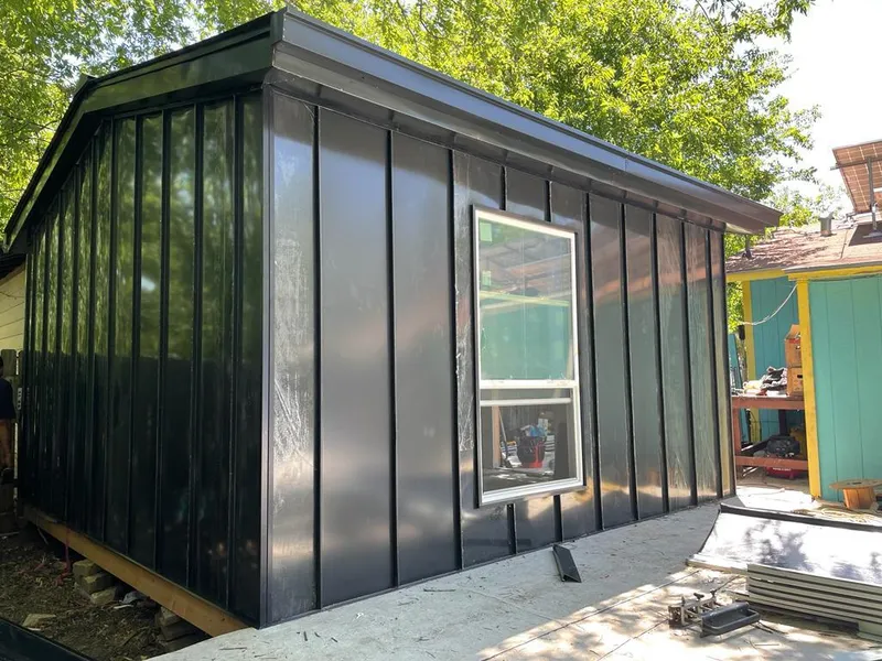 Black standing seam metal wall panels for Metal Roof Installation in Reston