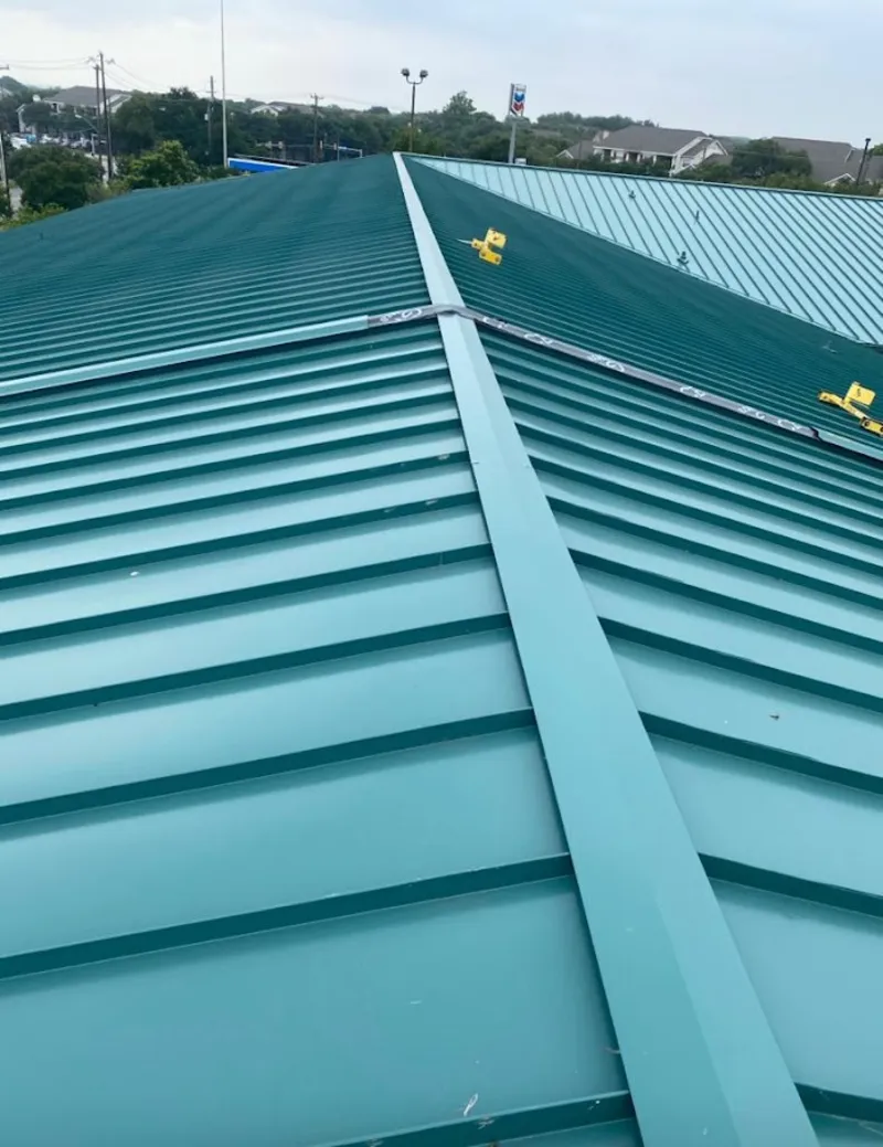 Green commercial metal roof ridge and valley for Metal Roof Repair in Reston